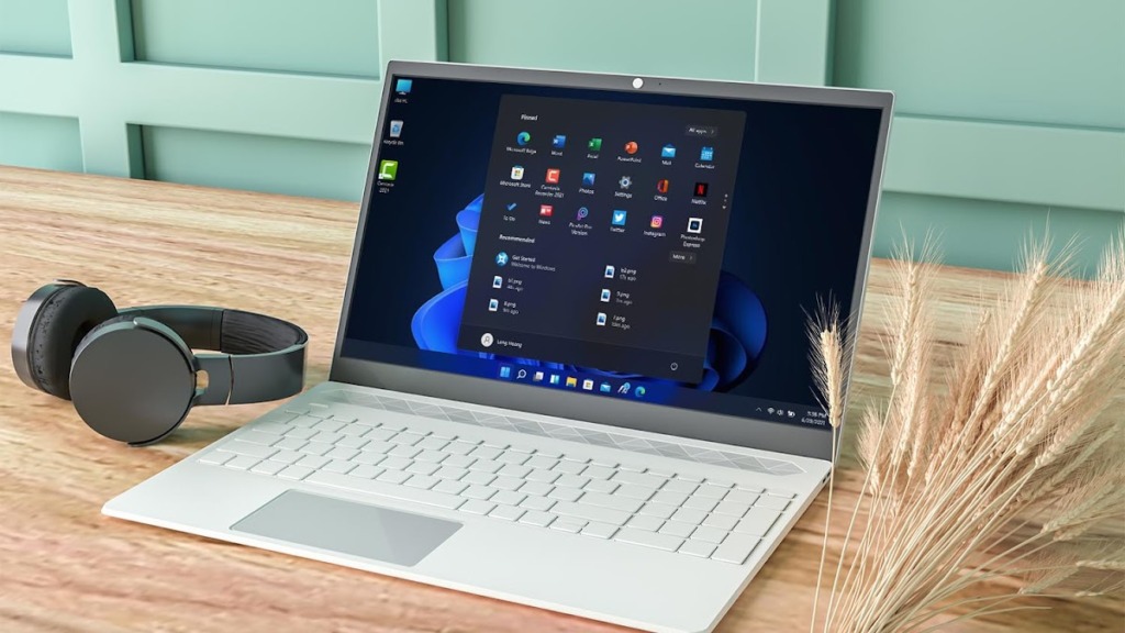 Laptop On Desk In Work Space Psd Mockup